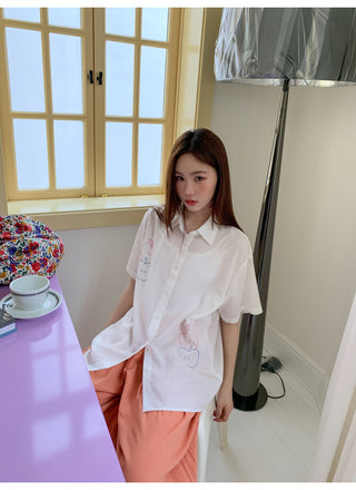 white embroidered shirt