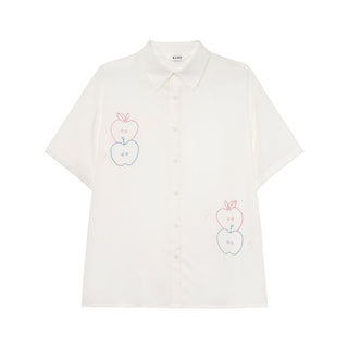 white embroidered shirt