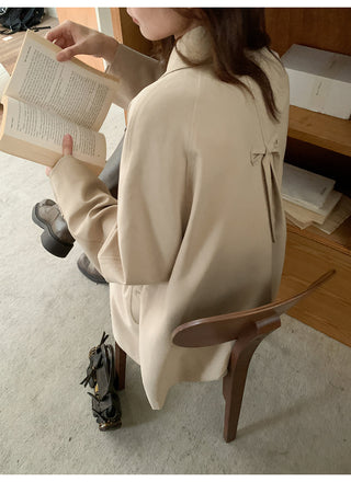 bow trench coat