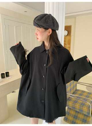 bow trench coat