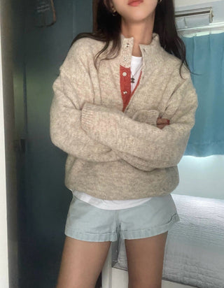 Hidden buckle pullover sweater
