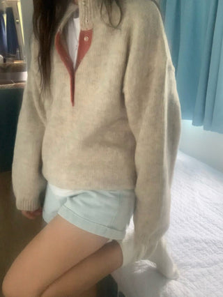 Hidden buckle pullover sweater
