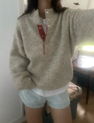 Hidden buckle pullover sweater