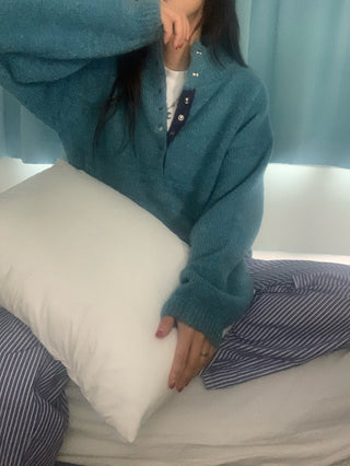Hidden buckle pullover sweater