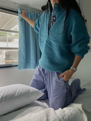 Hidden buckle pullover sweater