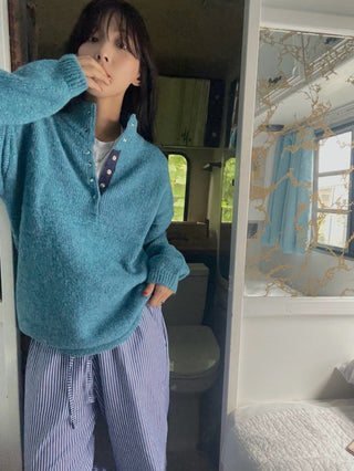 Hidden buckle pullover sweater