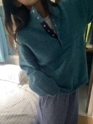 Hidden buckle pullover sweater