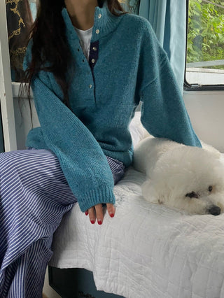 Hidden buckle pullover sweater