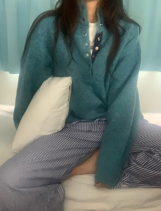 Hidden buckle pullover sweater