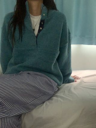 Hidden buckle pullover sweater