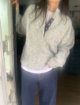 Hidden buckle pullover sweater
