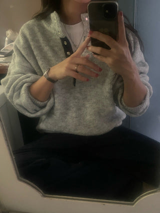 Hidden buckle pullover sweater