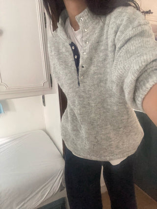 Hidden buckle pullover sweater