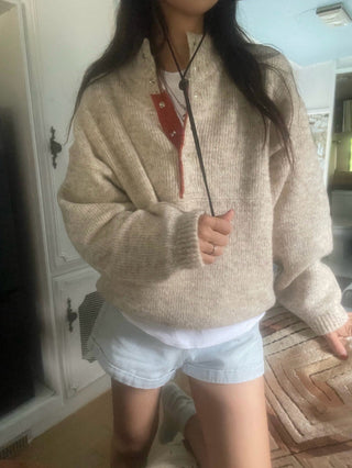Hidden buckle pullover sweater