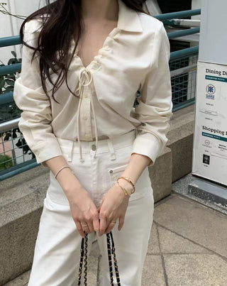 V-neck drawstring long sleeve shirt