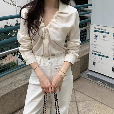 V-neck drawstring long sleeve shirt