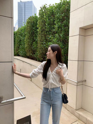 V-neck drawstring long sleeve shirt