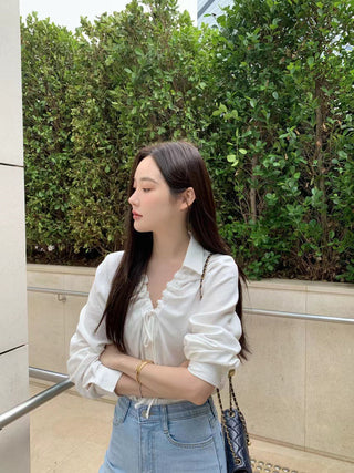 V-neck drawstring long sleeve shirt