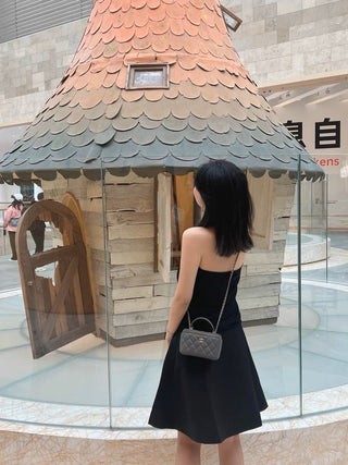 Pleated puffy black A-line skirt