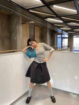 Pleated puffy black A-line skirt