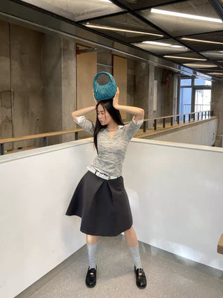 Pleated puffy black A-line skirt