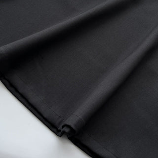 Pleated puffy black A-line skirt