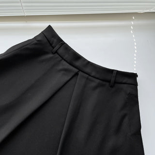 Pleated puffy black A-line skirt
