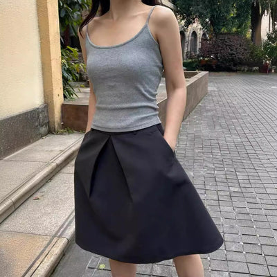 Pleated puffy black A-line skirt