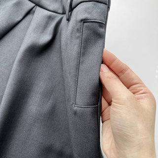 Pleated puffy black A-line skirt