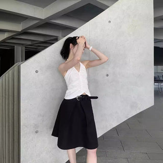 Pleated puffy black A-line skirt