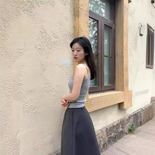 Pleated puffy black A-line skirt