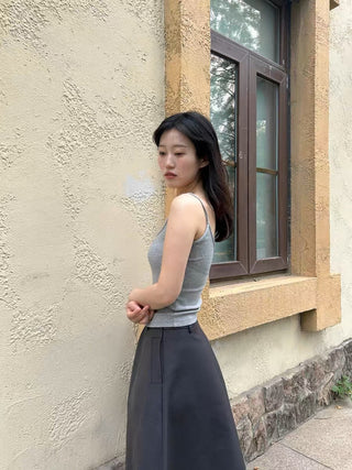 Pleated puffy black A-line skirt