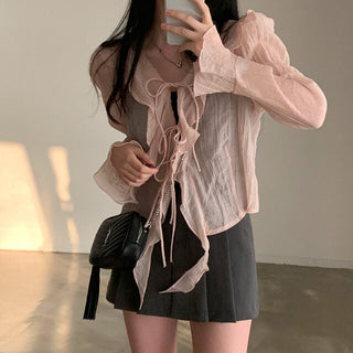 V-neck ruffled lace-up long sleeve top