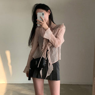 V-neck ruffled lace-up long sleeve top