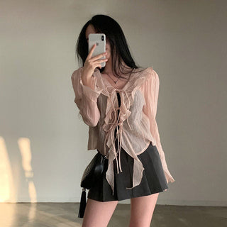 V-neck ruffled lace-up long sleeve top