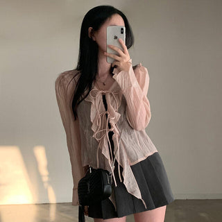 V-neck ruffled lace-up long sleeve top