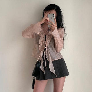 V-neck ruffled lace-up long sleeve top