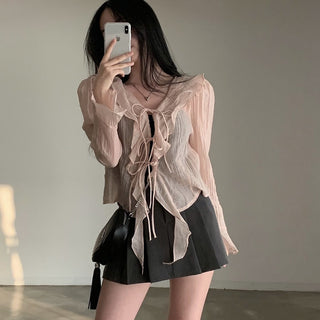 V-neck ruffled lace-up long sleeve top