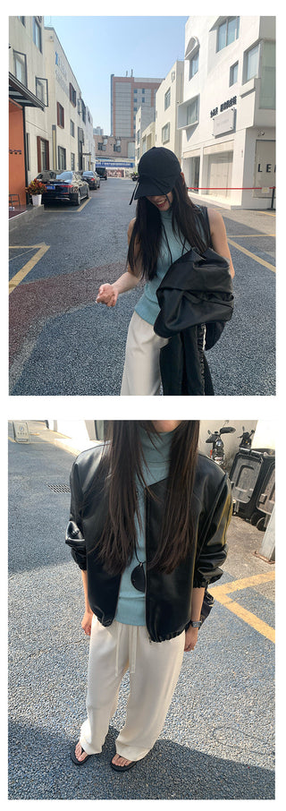 Turtleneck knit vest
