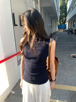 Turtleneck knit vest