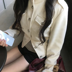 High-neck button collar crop jacket