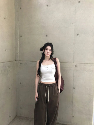 Strap pintuck pocket banding pants