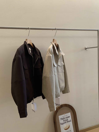 Pleated skirt suit