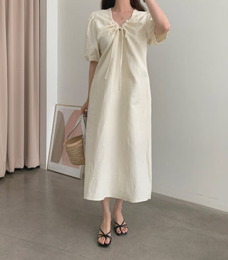 V-neck pleated dress