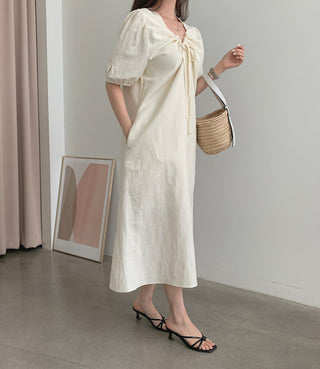 V-neck pleated dress