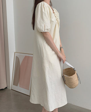 V-neck pleated dress