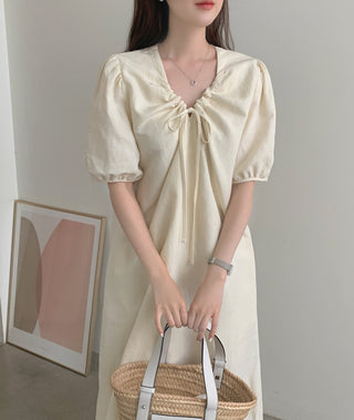 V-neck pleated dress