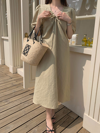 V-neck pleated dress