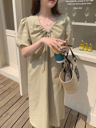 V-neck pleated dress