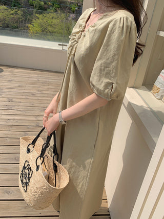 V-neck pleated dress